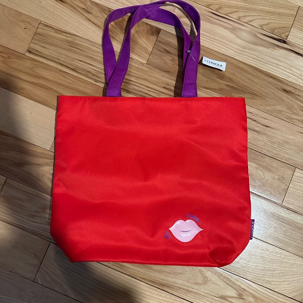 Clinique Red Tote Bag with Purple Handles